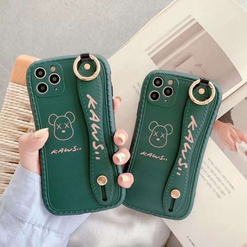 カウズ ブランド iphone12/12pro max/12 mini/12 pro maxケース ハンドバンド付き かわいい スタンド機能 KAWS 個性潮
