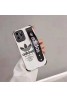 Adidas/アディダス ブランド iPhone 13 pro/13 pro max/13 miniケース インスタ ハンドバンド付 トレフォイル ストランプ付 斜め掛け モノグラム ジャケット型  全面保護 アイフォン13/12/11/x/xs/xr/8/7カバー シリコン メンズ レディース