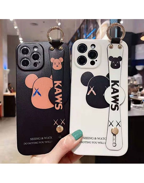 カウズ ブランド iphone12/12 pro/12 pro maxケース ハンドバンド付き 韓国風 ホルダー付 KAWS 個性潮 iphone x/xr/xs/xs maxケース 落下防止 ファッション ins風 iphone 11/11 pro/11 pro maxケース かわいい iphone x/8/7 plusケース大人気