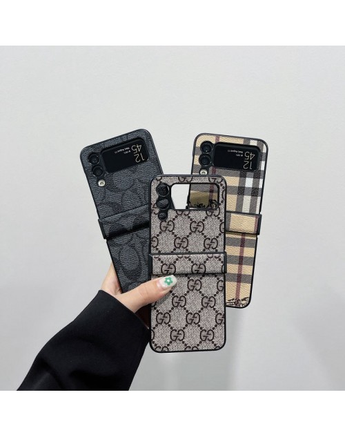 Gucci ハイブランド ギャラクシーZflip3 5Gスマホケース 定番柄 折畳み式 Galaxy Zflip3携帯ケースバーバリー レトロ レザー サムスンZflip3カバーCoachブランド 激安