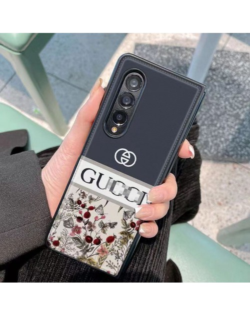 Gucci グッチ折畳み式 Galaxy Z Flip 5 4 3 2ケース かわいい 男女兼用 人気 ブランド ギャラクシーZフォールド5ケース 手帳型 ストラップ付き モノグラム galaxy z flip5 4ケース 個性 ギャラクシーZフォールド5 4スマホケース インスタ風 レディース