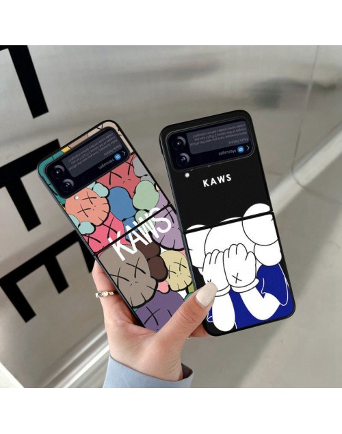 ハイブランドカウズ ギャラクシーZflip4 5Gスマホケース レザー アート サムスンZflip3カバーKaws 折畳み式 耐衝撃 Galaxy Zflip4携帯ケースKawsブランド 男女兼用