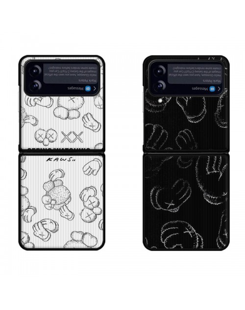 ハイブランドカウズ ギャラクシーZflip4 5Gスマホケース ペア揃い 2つ折り サムスンZflip3カバーKaws クルー ティーン Galaxy Zflip3/2携帯ケースKawsブランド ファッション 男女兼用