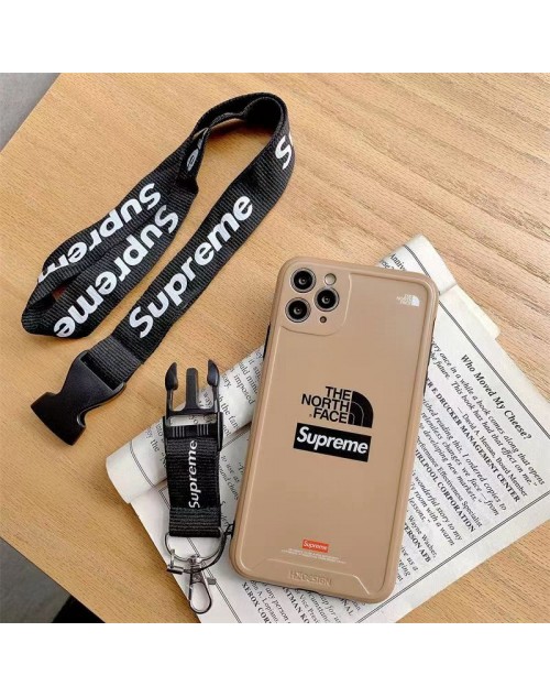 The North Face Supreme コラボ ブランド iphone14Pro max/14Pro14ケース 個性 ストラップ付き モノグラム シュプリーム ザノースフェイス ジャケット型 おしゃれ アイフォン14プロ マックス/14プロ/14/13/12/11カバー ハイブランド メンズ レディース