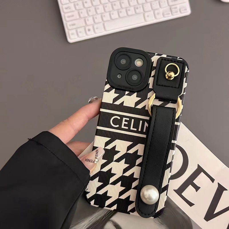Celine/セリーヌ ブランド iphone14/14 pro/14 pro maxケース 個性 ハンドバンド付 モノグラム リング付 レザー製 ジャケット型 黒白