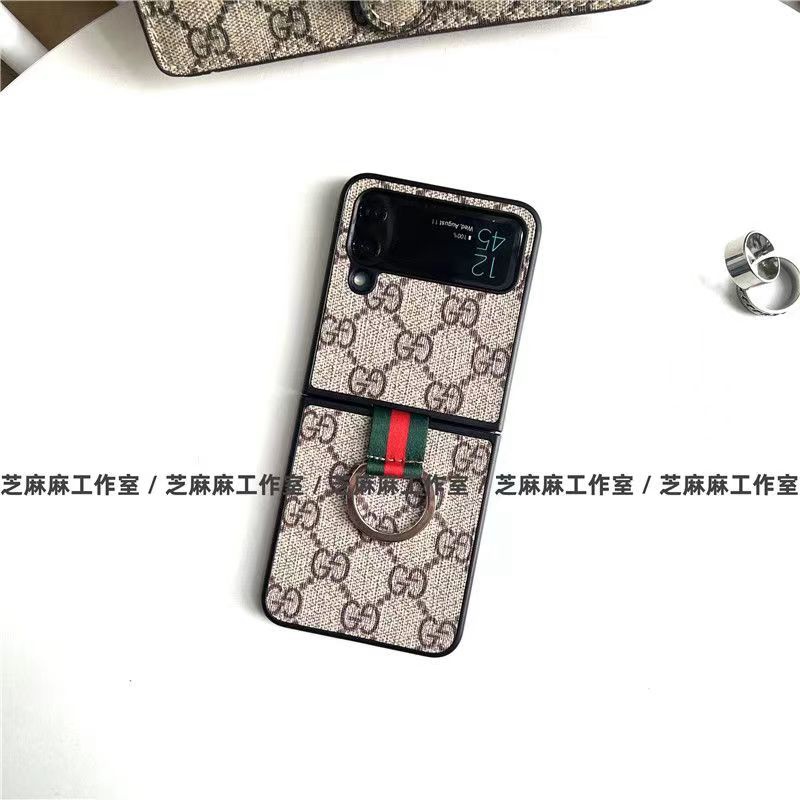 Gucci グッチ ハイブランド Galaxy z flip 4 5Gスマホケース モノグラム 折畳み式 ストラップ付き 便利