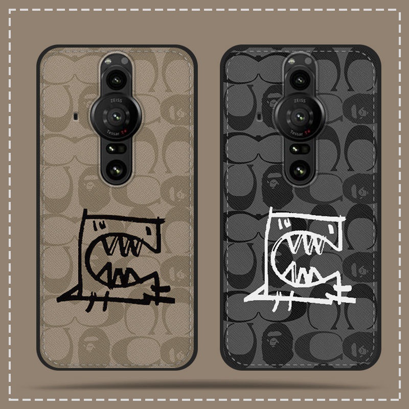 Coach コーチ ハイブランド iphone14 pro maxケース 怪獣柄 全機種対応 モノグラム ジャケット型 