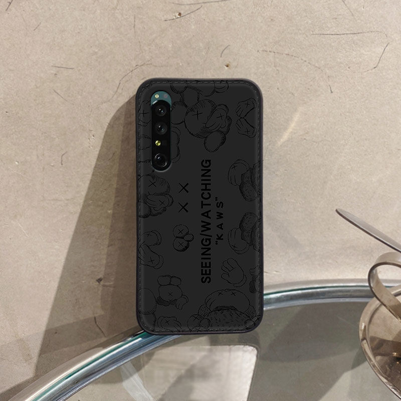カウズiphone14pro max/14plusケースkaws全機種galaxy a23 5g漫画ジャケット型 ペア揃い かわいい ブランドxperia5ivモノグラム男女